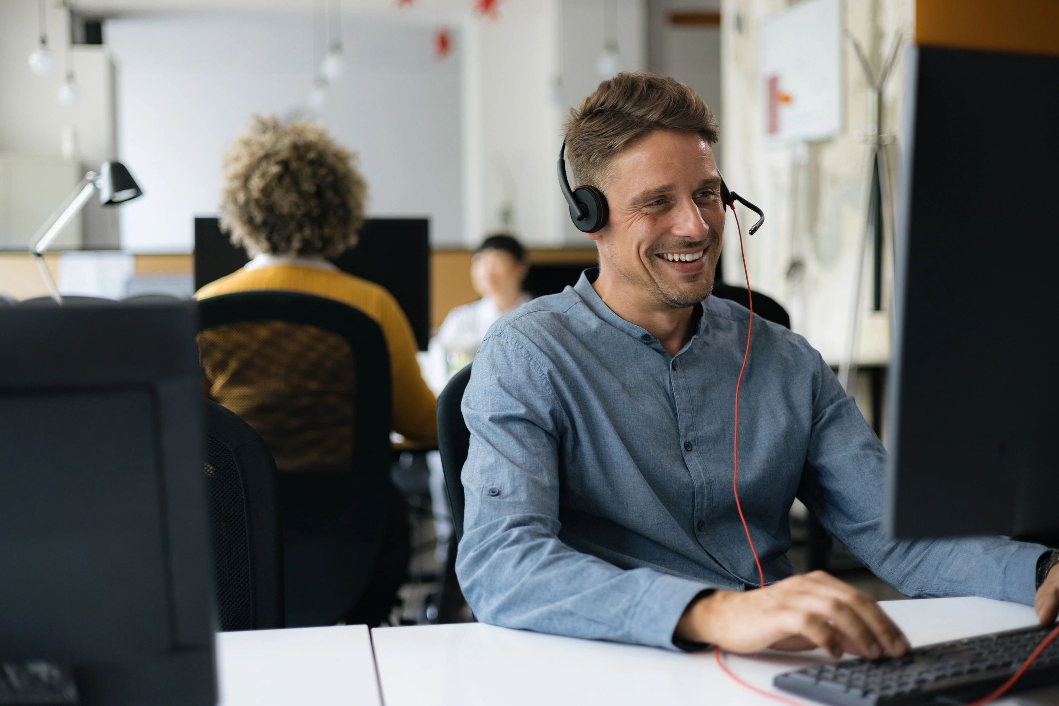 Customer service representative speaking on a headset
