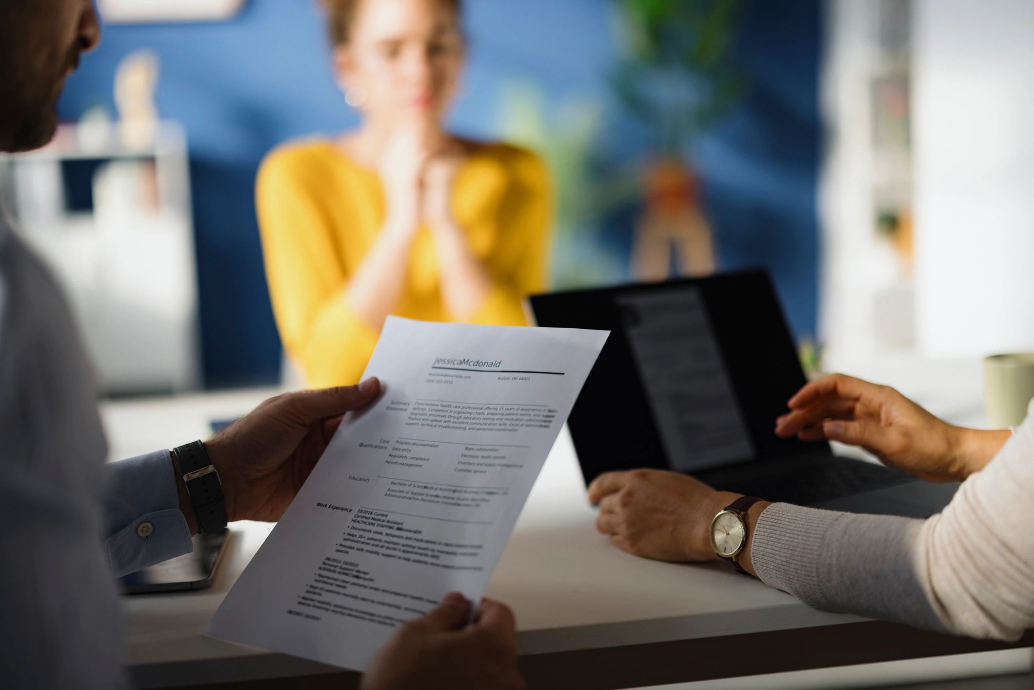 Reviewing a candidate resume during an interview