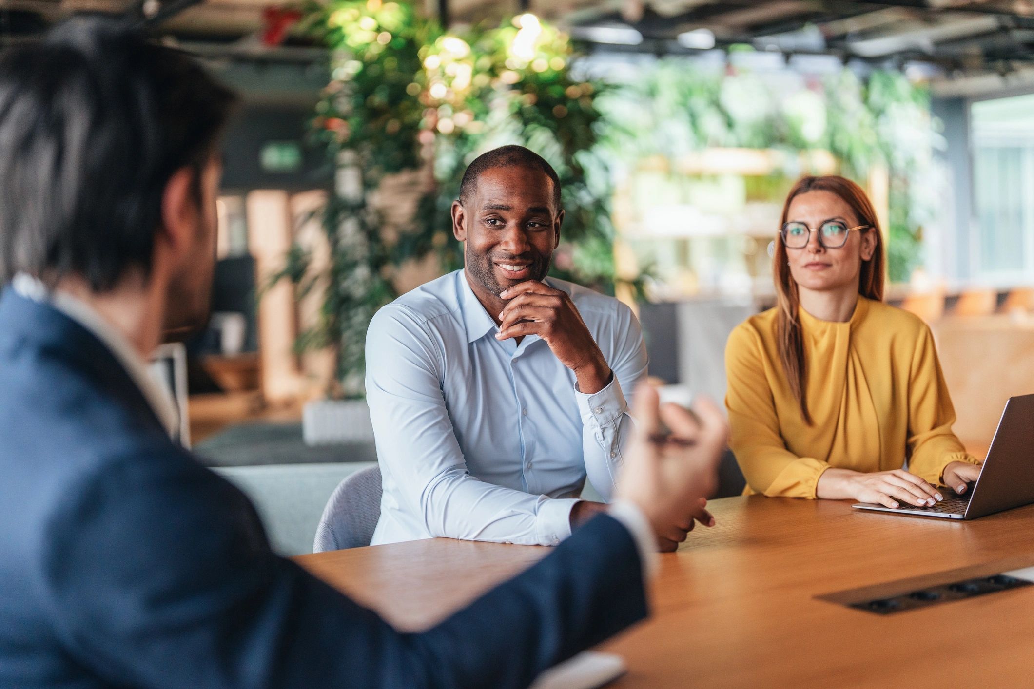 Professionals in a modern office meeting