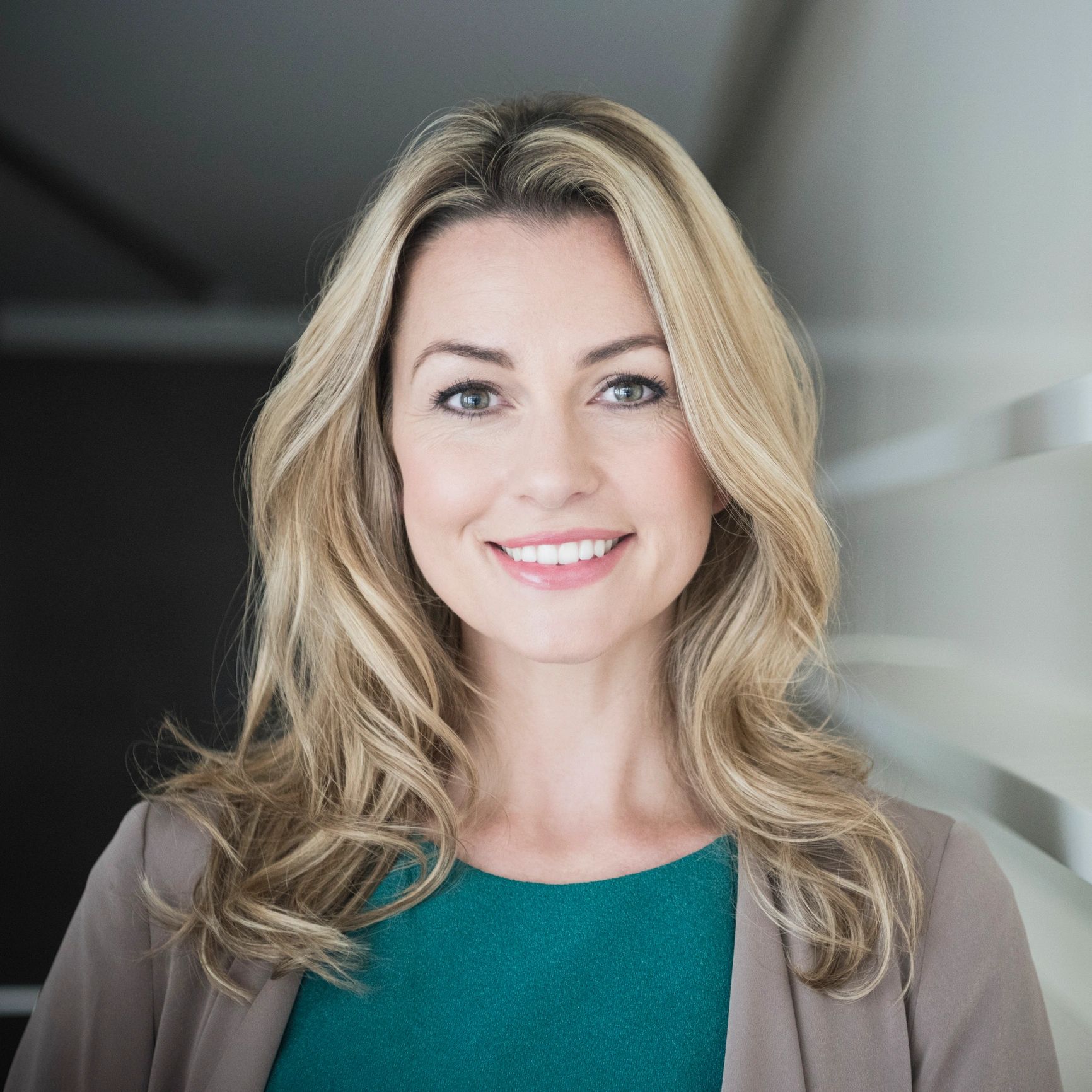 Professional headshot of a smiling businesswoman